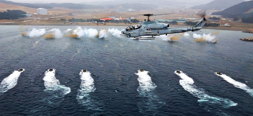 Troops from the Republic of Korea Marines and the 7th Marine Regiment participate in a mock amphibious landing during exercise Ssang Yong, on March 29, 2014.