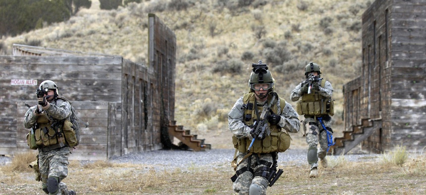 U.S. Army Soldiers with the 19th Special Forces conduct an urban village assault at Camp Williams, Utah.