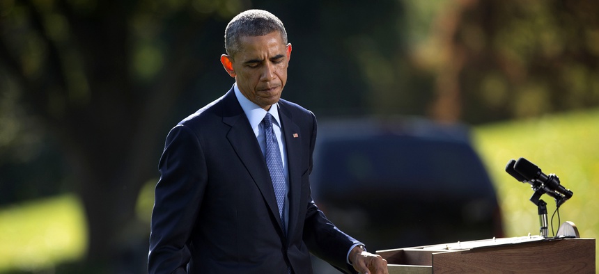 President Obama walks away from the podium after speaking about Ebola from the South Lawn of the White House on the Ebola crisis, on October 28, 2014.