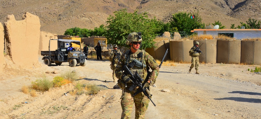 Capt. Tara Robertson, the commander of the Minnesota National Guard's 849th Mobility Augmentation Company, patrols in Afghanistan.