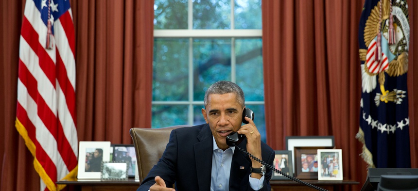 President Obama speaks on a conference call with service members in LIberia and Senegal, on November 1, 2014.