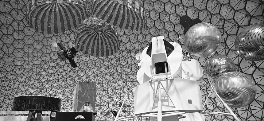 Workmen give minute touches inside the United States Pavilion before opening of Montreal’s Expo 67 on April 26, 1967.