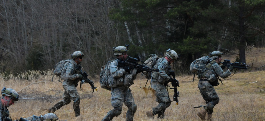 U.S. Army soldiers with the 173rd BCT move to a fighting position during a search and attack training exercise in Grafenwoehr, Germany.