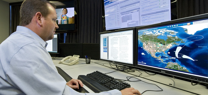 A cyber security analyst works in a "watch and warning center" during a tour of the government's secretive cyber defense lab in Idaho Falls, Idaho.
