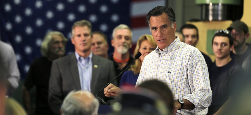 Former Republican Presidential candidate Mitt Romney speaks at a rally for New Hampshire Senate candidate Scott Brown, on October 15, 2014.