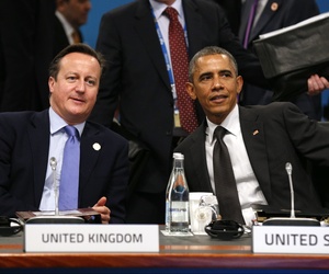 President Barack Obama and British Prime Minister David Cameron talk at the start of the plenary session at the G20 Summit in Brisbane, Australia, on November 15, 2014. President Barack Obama and British Prime Minister David Cameron talk at the start of the plenary session at the G20 Summit in Brisbane, Australia, on November 15, 2014.