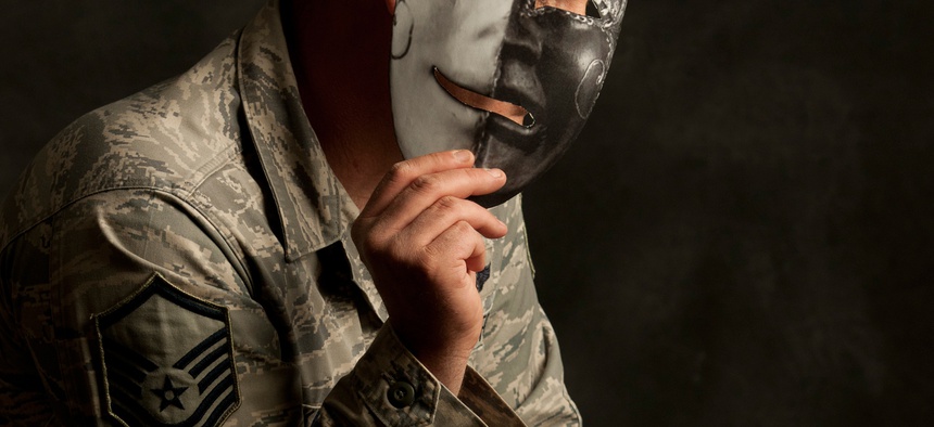 An Airman who struggles with Post-Traumatic Stress Disorder and says putting on a happy face to get through a day is like wearing a mask.