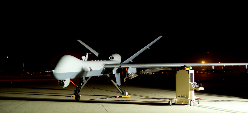 An MQ-9 Reaper sits on the flight line at Hurlburt Field, Fla., April 24, 2014.
