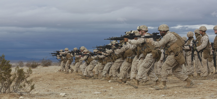 Marines with Combat Logistics Detachment 1, practice combat gliding during an exercise at Camp Wilson, on Jan. 31, 2015.