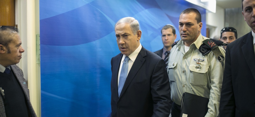 Israeli Prime Minister Benjamin Netanyahu arrives to a weekly cabinet meeting in Jerusalem, on Jan. 25, 2015.