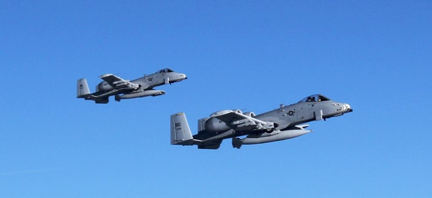 A-10 Thunderbolt II aircraft flown by pilots from the 107th Fighter Squadron head toward Afghanistan after departing Selfridge Air National Guard Base, Mich., Sept. 26, 2011.