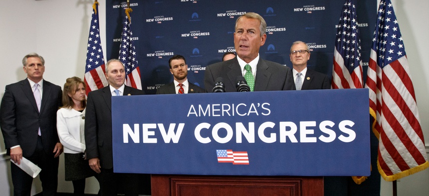 House Speaker John Boehner of Ohio speaks to reporters following a House GOP caucus meeting on Capitol Hill in Washington, Wednesday, Jan. 7, 2015.