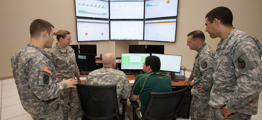 Soldiers with the Georgia Army National Guard train at the GTRI on cyber defense capabilities.