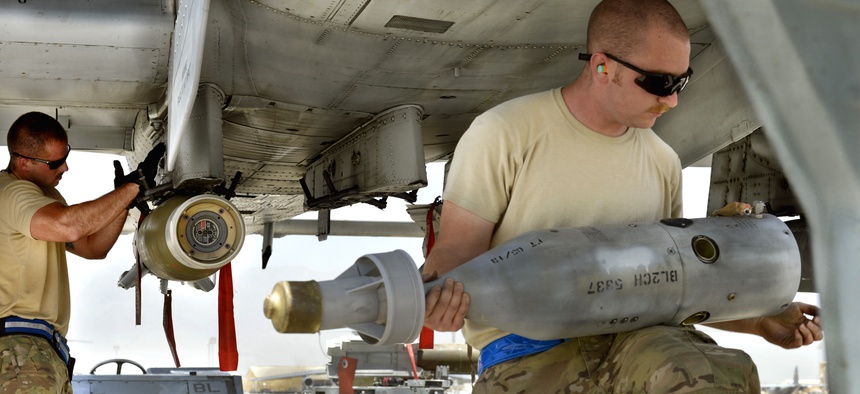 Airmen load a precision-guided munitions on an A-10 Warthog in Afghanistan.