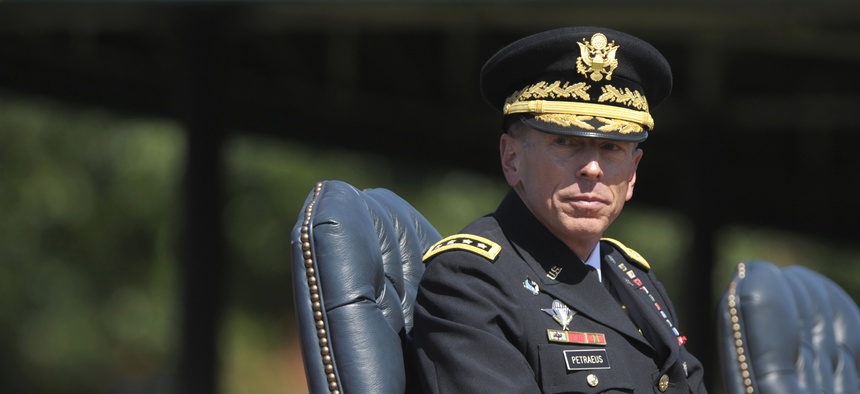 Then ISAF Commander Gen. David Petraeus participates in a retirement ceremony at Joint Base Myer-Henderson Hall in Arlington, VA, on Aug. 31. 2011.
