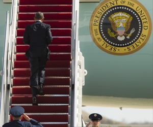 President Barack Obama climbs the steps of Air Force One before departure at Andrews Air Force Base, Md., Wednesday, March 18, 2015. President Barack Obama climbs the steps of Air Force One before departure at Andrews Air Force Base, Md., Wednesday, March 18, 2015.
