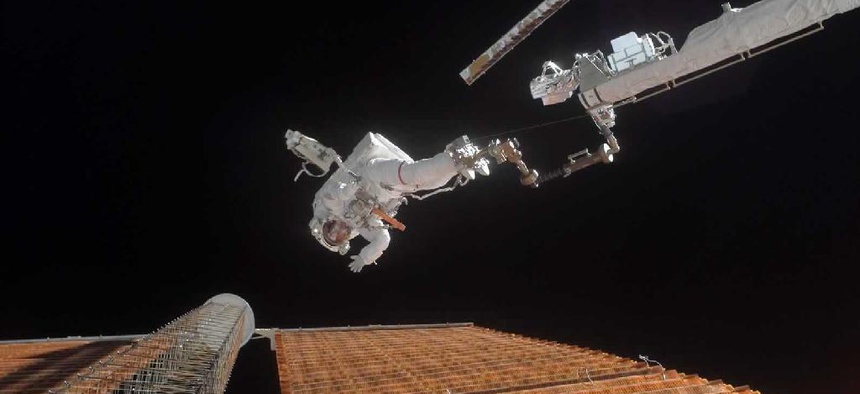 A NASA astronaut goes on a spacewalk to repair a damaged solar panel on the ISS.