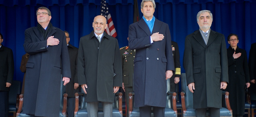 From left to right: Secretary of Defense Ash Carter, Afghan President Ashraf Ghani, Secretary of State John Kerry and Afghan Chief Executive Officer Abdullah Abdullah stand during an honor cordon at the Pentagon, on March 23, 2015.