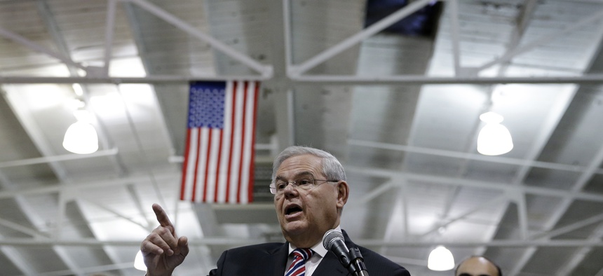 U.S. Sen. Robert Menendez, D-NJ, answers a question as he addresses a gathering Monday, March 23, 2015.