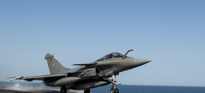 A French navy Rafale Marine aircraft launches from the U.S. Navy aircraft carrier USS Carl Vinson, on March 3, 2015.