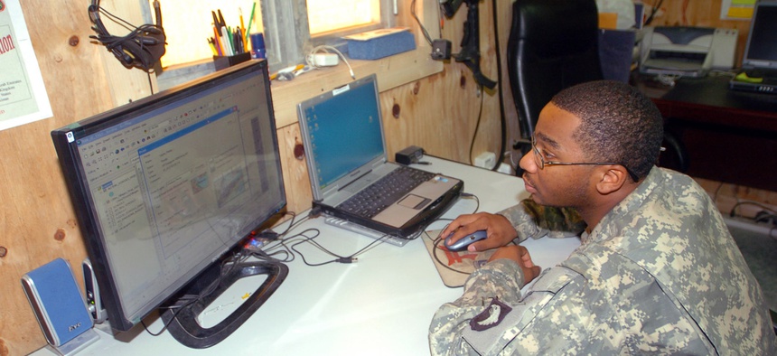 A geospatial analyst creates a map using Arc Geospatial Intelligence Support Program.