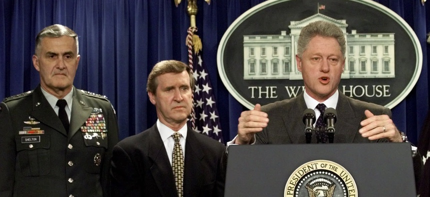 President Clinton announces that Iraq has "backed down" and has agreed to unconditional inspections by UN weapons inspectors during an appearance in the White House briefing room Sunday Nov. 15, 1998.
