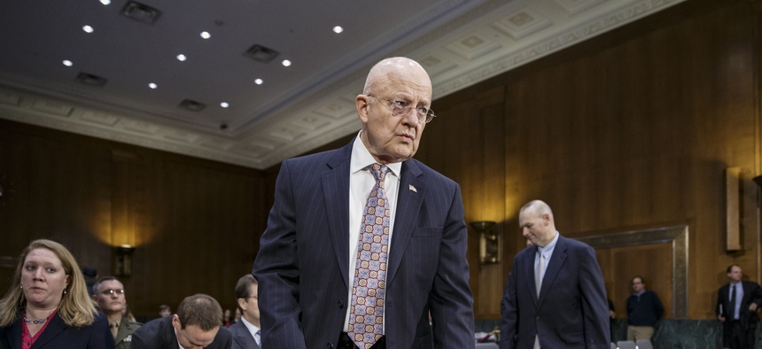 Director of National Intelligence James Clapper arrives on Capitol Hill in Washington, Thursday, Feb. 26, 2015, to testify before the Senate Armed Services Committee.
