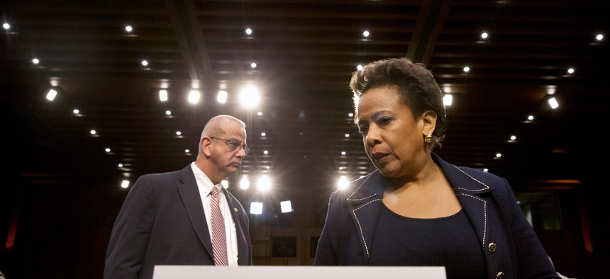 Attorney general nominee Loretta Lynch returns to Capitol Hill in Washington, Wednesday, Jan. 28, 2015, after a short break for her confirmation hearing before the Senate Judiciary Committee.