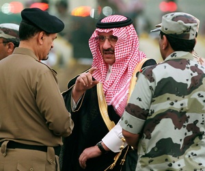 Prince Mohammed bin Nayef bin Abdul Aziz, Saudi Deputy Interior Minister at the time, speaks with Saudi officials while he attends a martial parade of Saudi armed forces outside Mecca in October 2012.