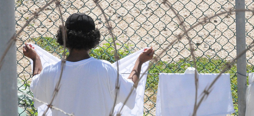 A detainee hangs his laundry in the recreation area of Camp Four at Joint Task Force Guantanamo in a 2010 photo.