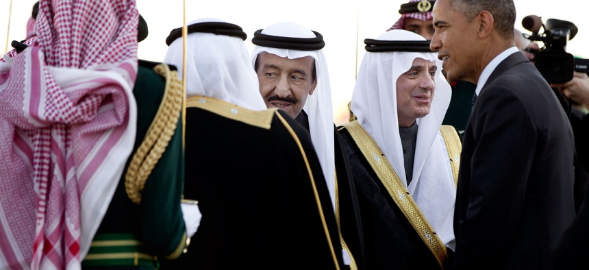 In this Tuesday, Jan. 27, 2015 file photo, President Barack Obama is greeted by new Saudi King Salman bin Abdul Aziz as the president and first lady Michelle Obama arrive on Air Force One at King Khalid International Airport, in Riyadh, Saudi Arabia.