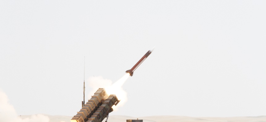 A Patriot missile is launched by Soldiers from C-Battery, 3rd Battalion (Airborne), 4th Air Defense Field Artillery Regiment, 108th Air Defense Artillery Brigade, at an airborne target during a joint live-fire exercise held Oct. 1, 2014.