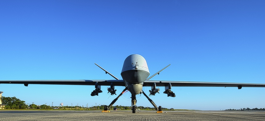n MQ-9 Reaper sits on the flight line at Hurlburt Field, Fla., May 3, 2014.