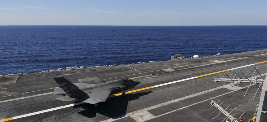 An F-35C Lightning II carrier variant Joint Strike Fighter conducts it’s first arrested landing aboard the aircraft carrier USS Nimitz (CVN 68).