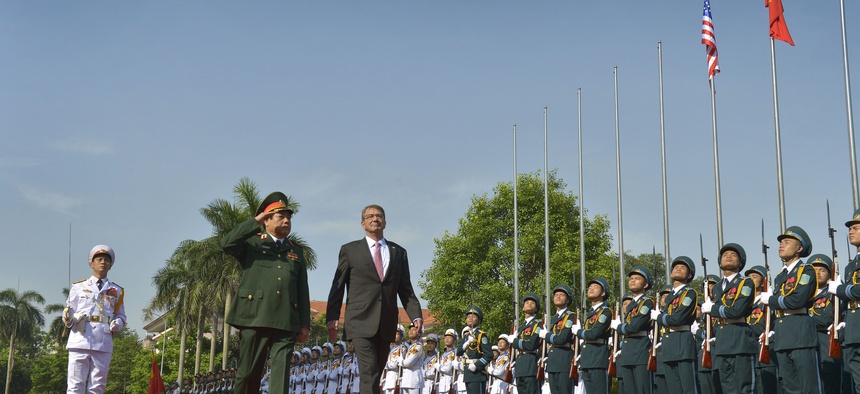 Secretary of Defense Ash Carter is welcomed with an honor cordon by Vietnamese Minister of Defense General Phung Quang Thanh n Hanoi, Vietnam, June 1, 2015.