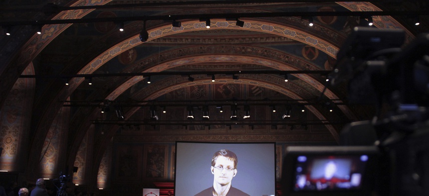 National Security Agency leaker Edward Snowden appears on a live video as he attends a International Journalism Festival panel via Skype, on April 17, 2015.