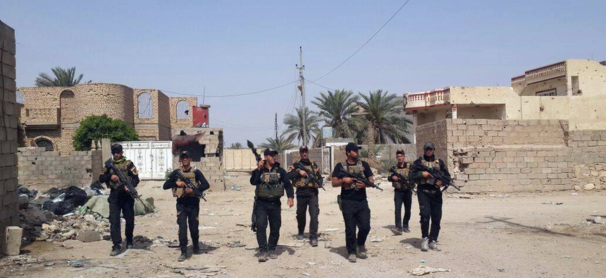Iraqi anti-terrorism forces patrol in Ramadi, Iraq, Saturday, April 18, 2015.