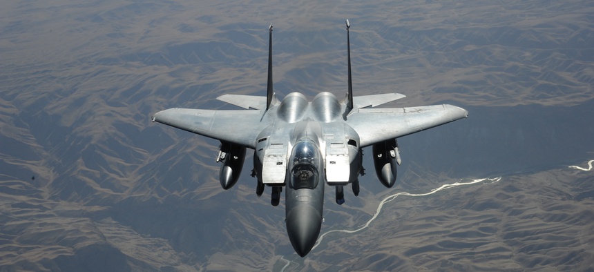 A U.S. Air Force F-15E Strike Eagle fighter aircraft flies over the skies of Afghanistan on July 30, 2011.