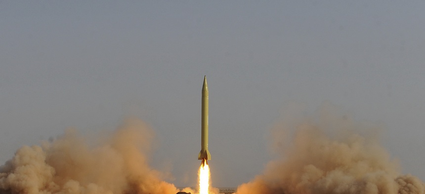 An Iranian Shahab-3 missile is launched during military maneuvers outside the city of Qom, Iran, Tuesday, June 28, 2011.