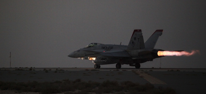 A U.S. Marine Corps F/A-18 Hornet launches for a strike mission in Southwest Asia, June 10, 2015.