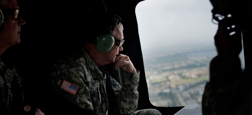 Gen. Martin E. Dempsey above the Mississippi River and its levee system, May 21, 2011.