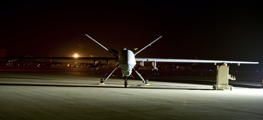 An MQ-9 Reaper sits on the flight line at Hurlburt Field, Fla., April 24, 2014.