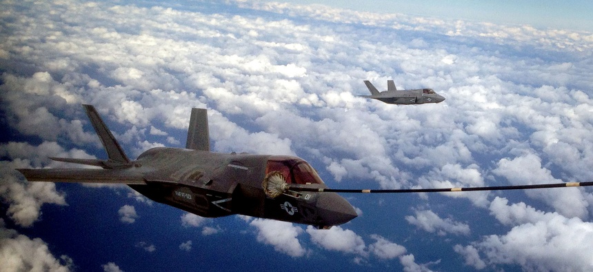 Two F-35B Joint Strike Fighters conduct the first aerial refueling of its kind with a KC-130J Hercules in the sky above Eglin Air Force Base, Fla., Oct. 2. 2012.