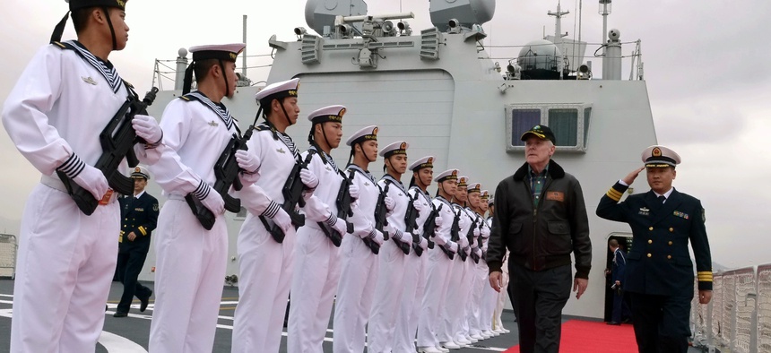 Chinese sailors render honors to Secretary of the Navy Ray Mabus in 2012.