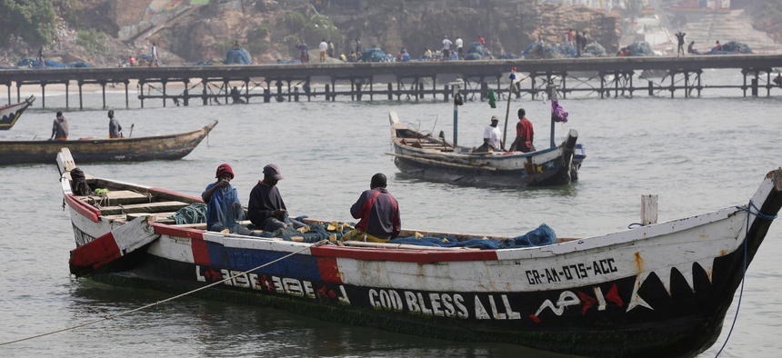 Fishermen arrive at the fishing beach in James Town, Accra, Ghana, Thursday, July 9, 2015.