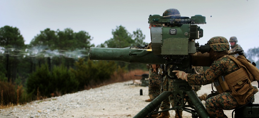 Sgt. Danielle V. Beck, anti-tank missileman with Anti-Armor Section, Weapons Company, Ground Combat Element Integrated Task Force, fires an M41A4 Saber missile launcher during a live-fire exercise.