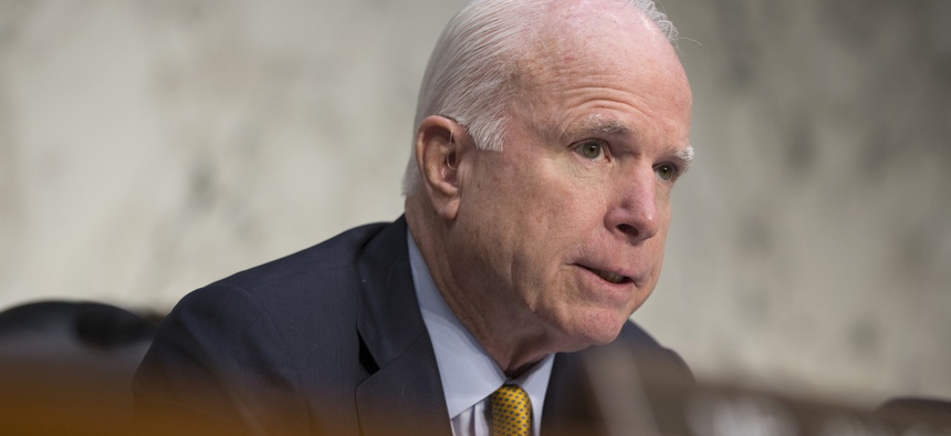 Senate Armed Services Committee Chairman Sen. John McCain, R-Ariz. questions former CIA Director David Petraeus during the committee's hearing on Middle East policy, Tuesday, Sept. 22, 2015, on Capitol Hill in Washington.