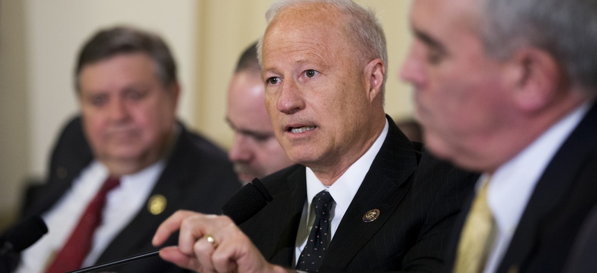 House Veterans' Affairs Committee member Rep. Mike Coffman gets into a heated exchange with Department of Veterans Affairs Secretary Robert McDonald.