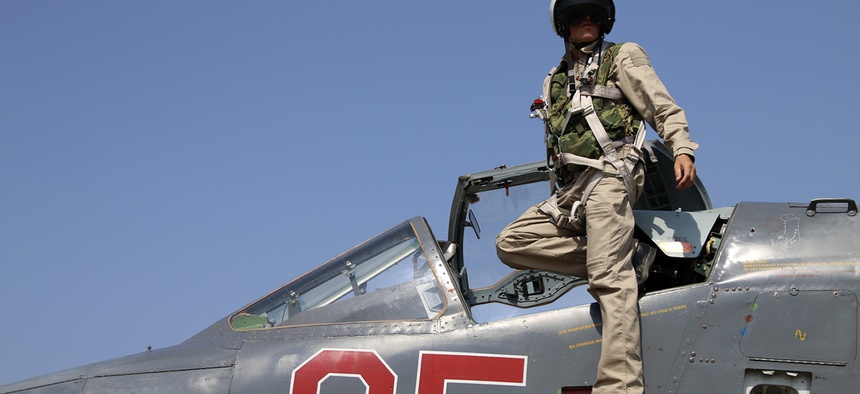 A Russian pilot in his SU-25M fighter at Hmeimim airbase in Syria, Saturday, Oct. 3. Russian forces would escalate attacks in Syria the following week.