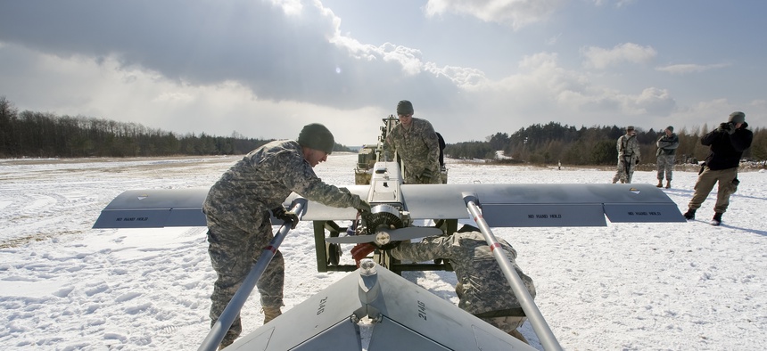 Members of the Nomad troop, 2nd Stryker Calvalry Regiment, US Army Europe, prep their Shadow unmanned aeirial vehicle for launch at Hohenfels Training Area.